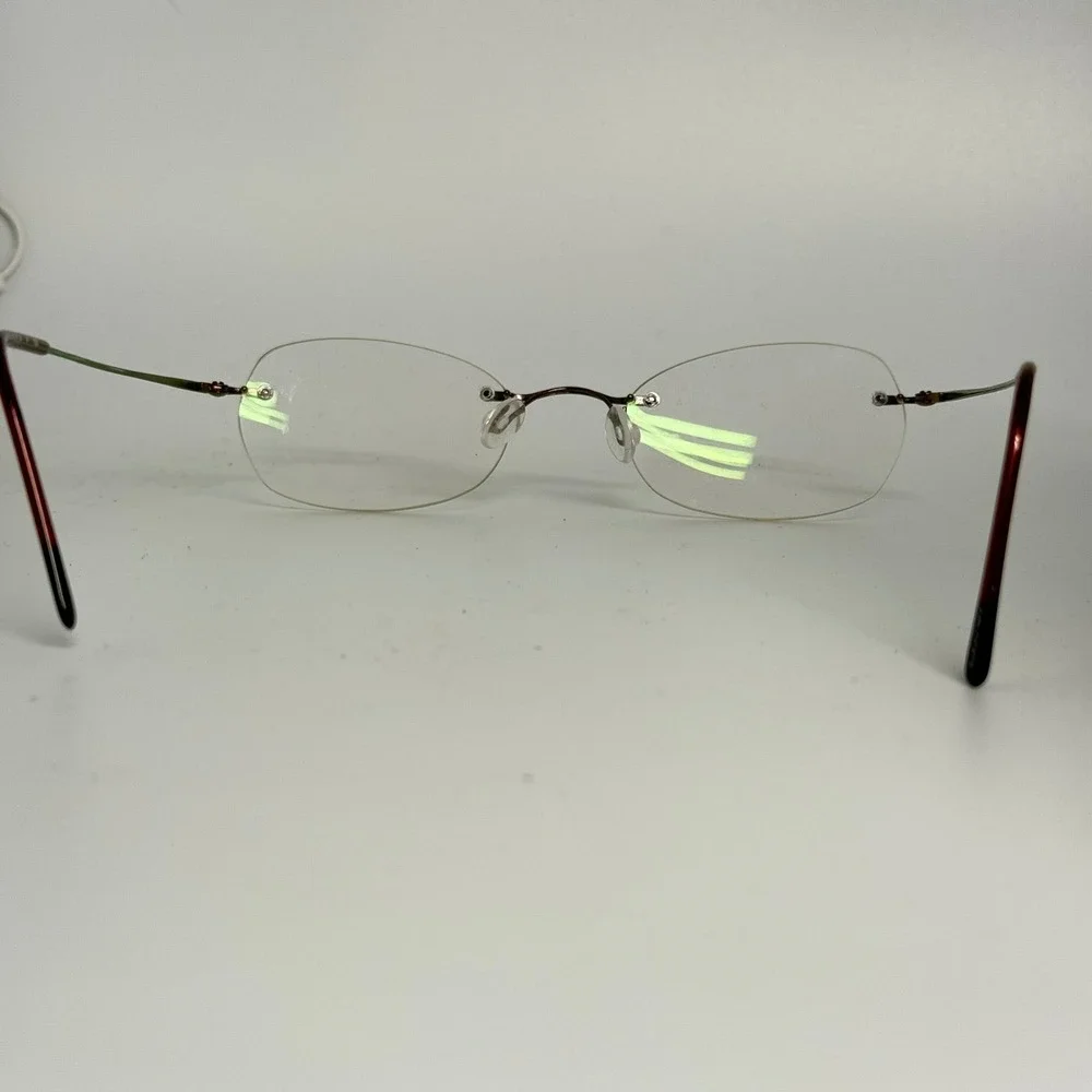 Marchon Airlock 2 Rimless‎ Eyeglasses Burgundy Red Metal 760 91 Italy 135mm